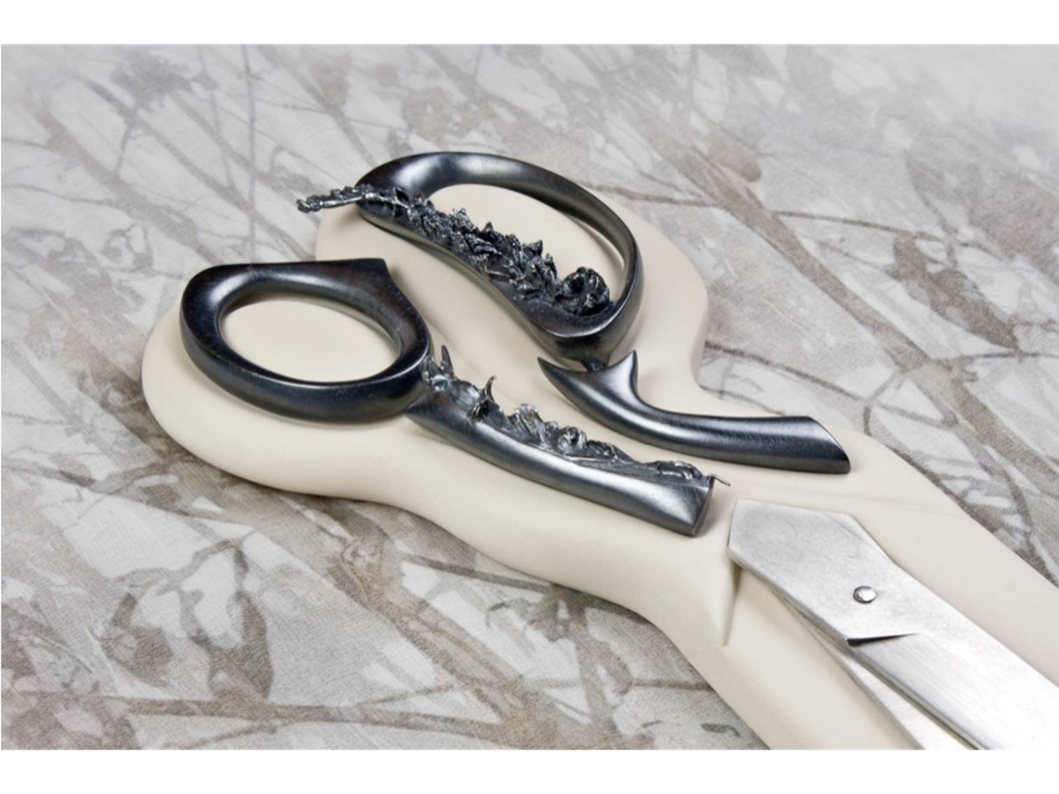 sculpture of handmade scissors with decorative handles